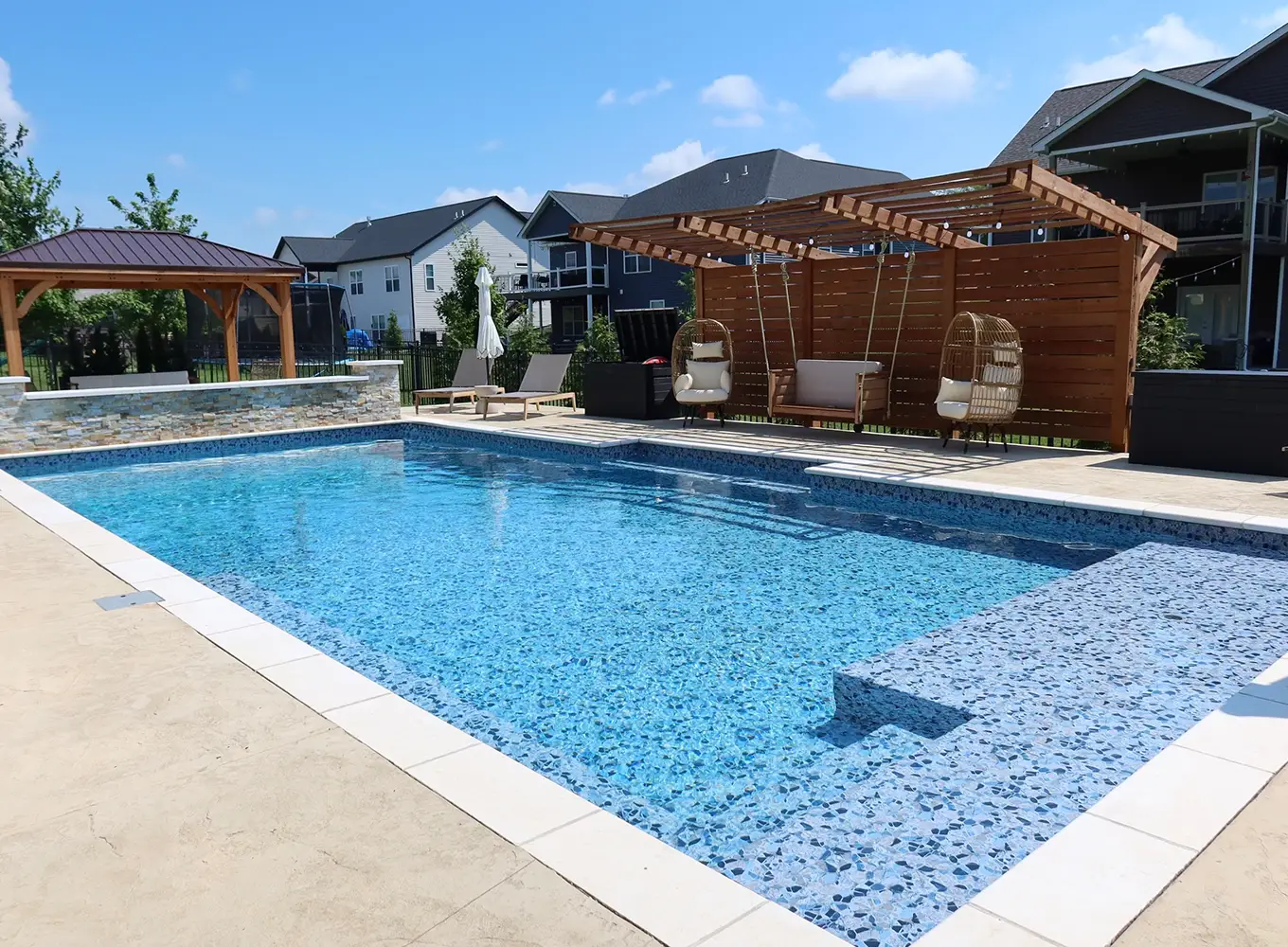 vinyl pool with pergola and custom water feature in collinsville il